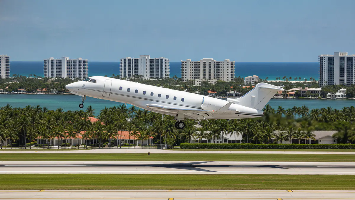 Boca Raton private jets Boca Raton private jets: business jet taking off with Boca Raton in the background