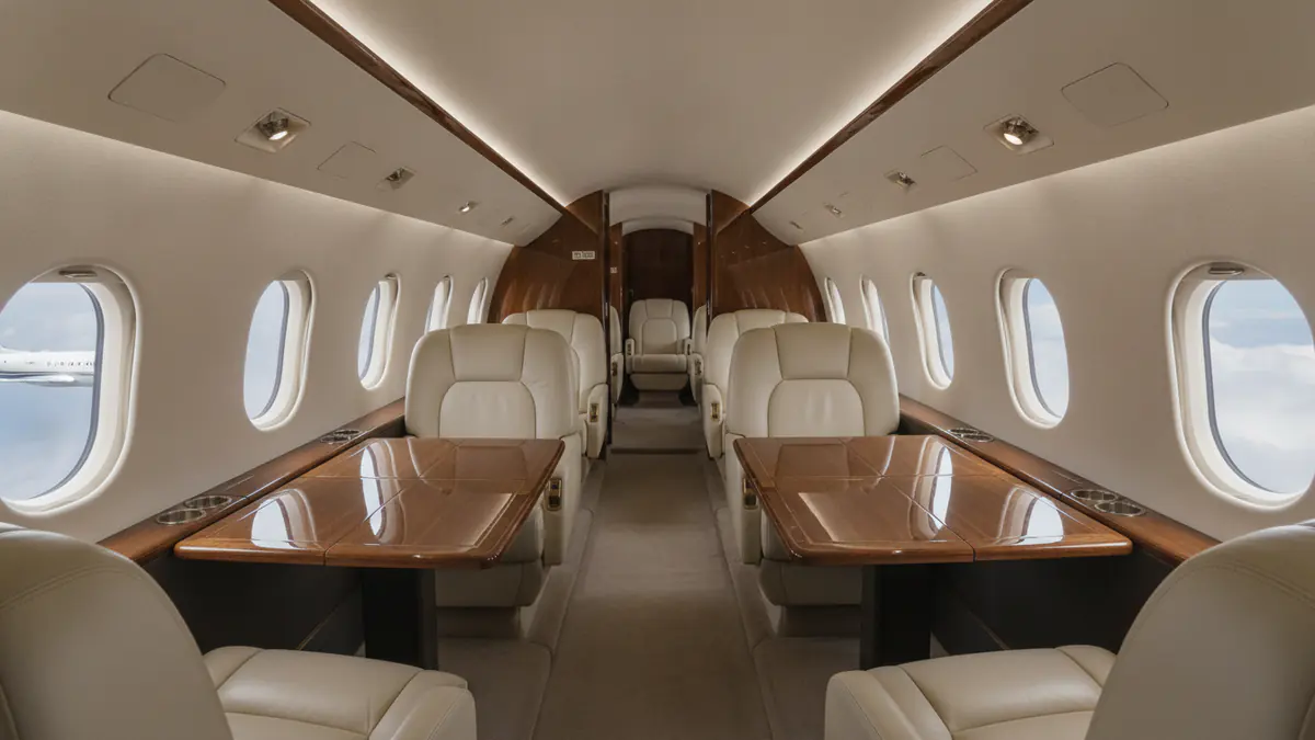 Heavy jet charter Heavy jet charter: heavy jet cabin with leather seats and oval windows