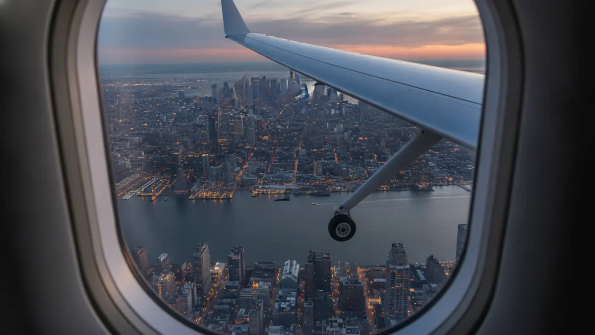 Private jet Boston to New York Private jet Boston to New York: cabin window view on approach to New York