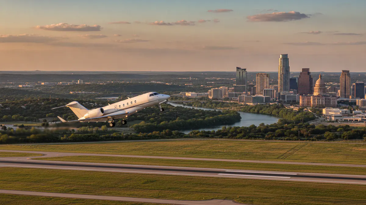 Private jet charter Austin Private jet charter Austin: business jet taking off with Austin in the background