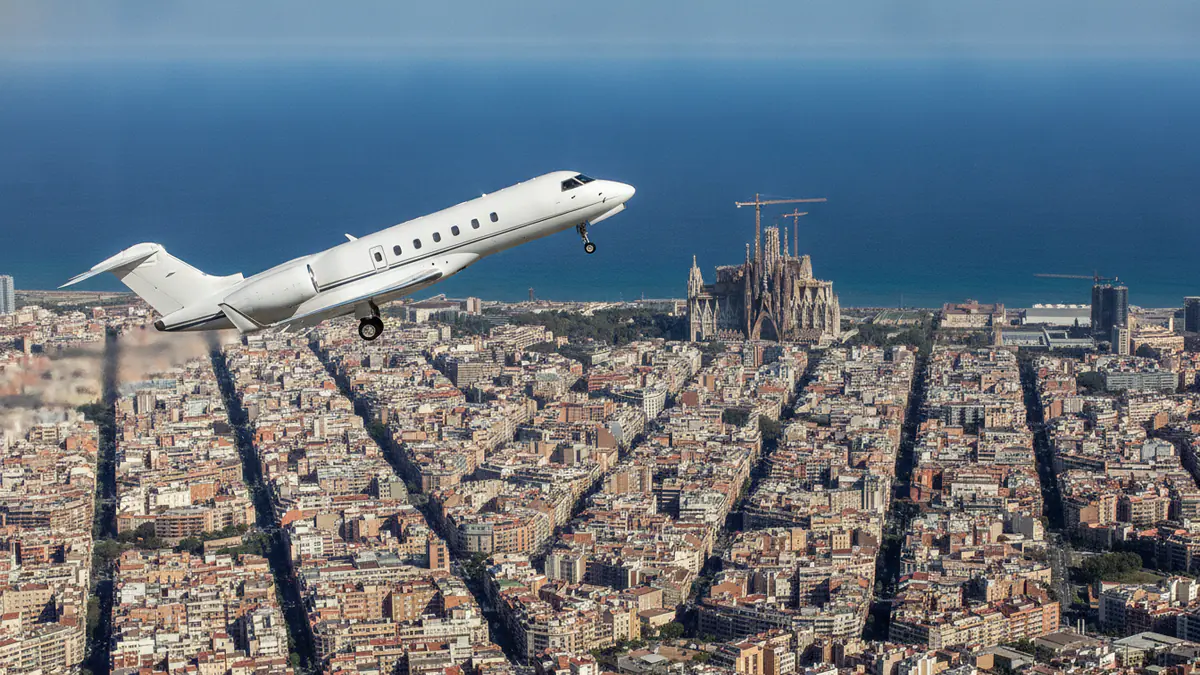 Private jet charter Barcelona Private jet charter Barcelona: business jet taking off with Barcelona in the background