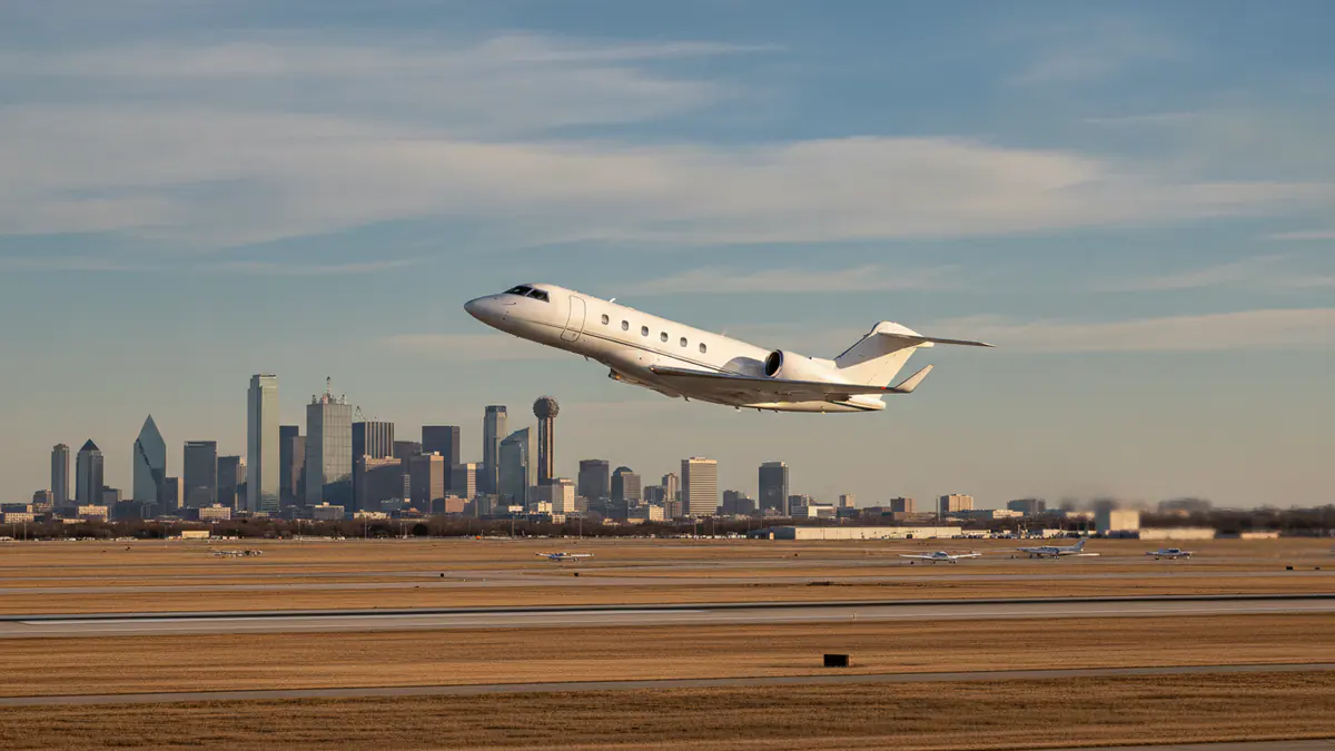Private jet charter Dallas Private jet charter Dallas: business jet taking off with Dallas in the background