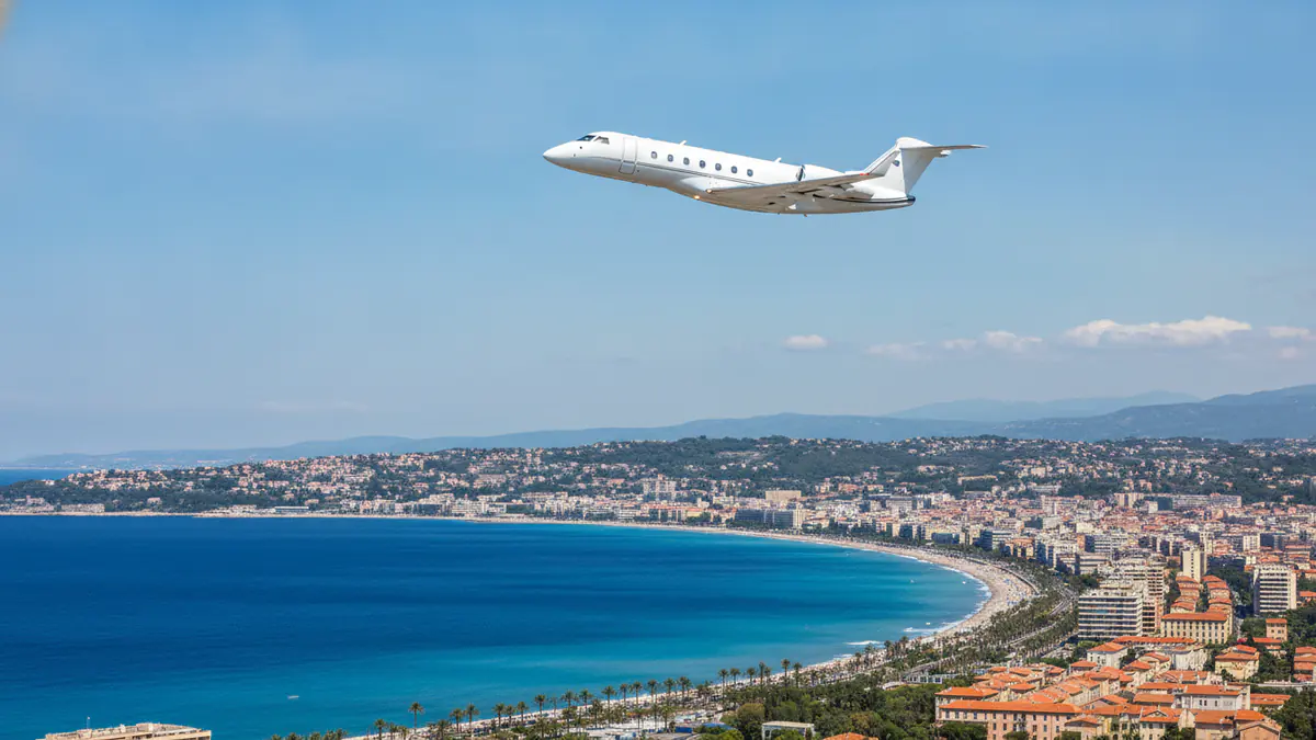 Private jet charter Nice: business jet taking off with Nice in the background