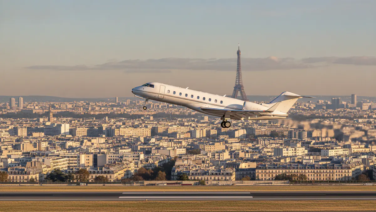 Private jet charter Paris Private jet charter Paris: business jet taking off with Paris in the background