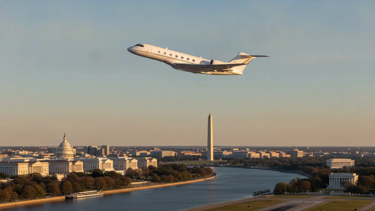 Private jet charter Washington dc: business jet taking off with Washington, D.C. in the background