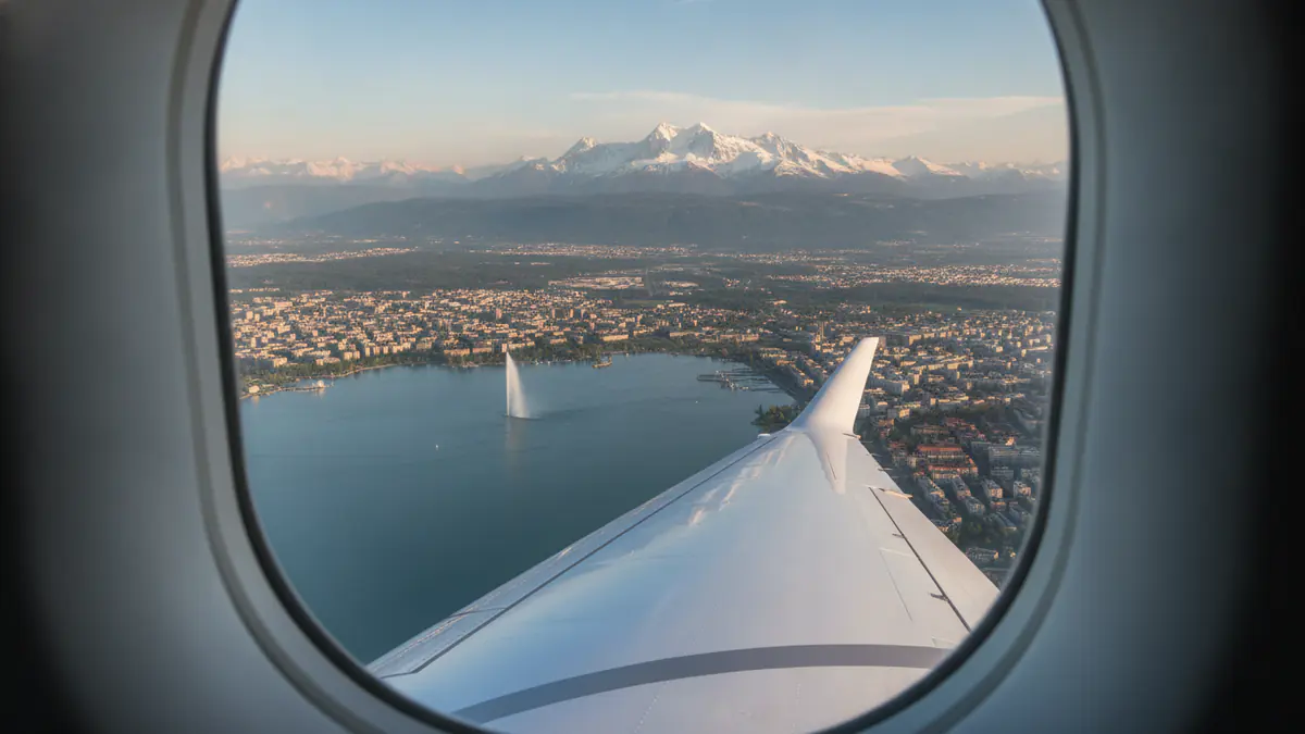Private jet Dubai to Geneva Private jet Dubai to Geneva: cabin window view on approach to Geneva