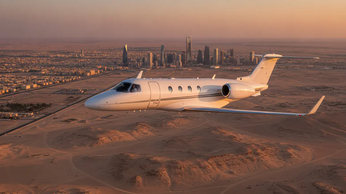 Private jet Dubai to Riyadh Private jet Dubai to Riyadh: light jet descending towards Riyadh