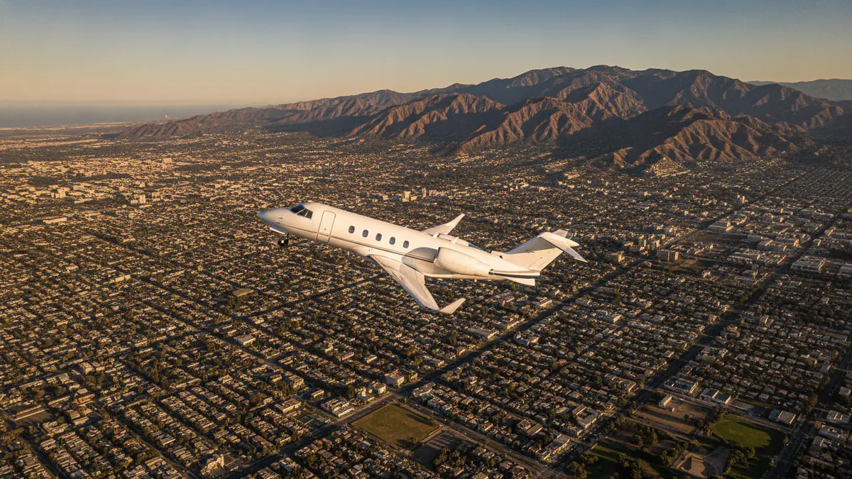 Private jet Los Angeles to Las Vegas: light jet climbing out of Los Angeles