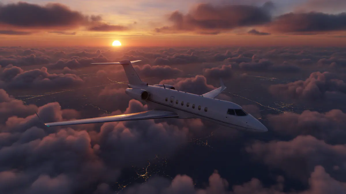 Private jet routes: business jet above the clouds at sunset