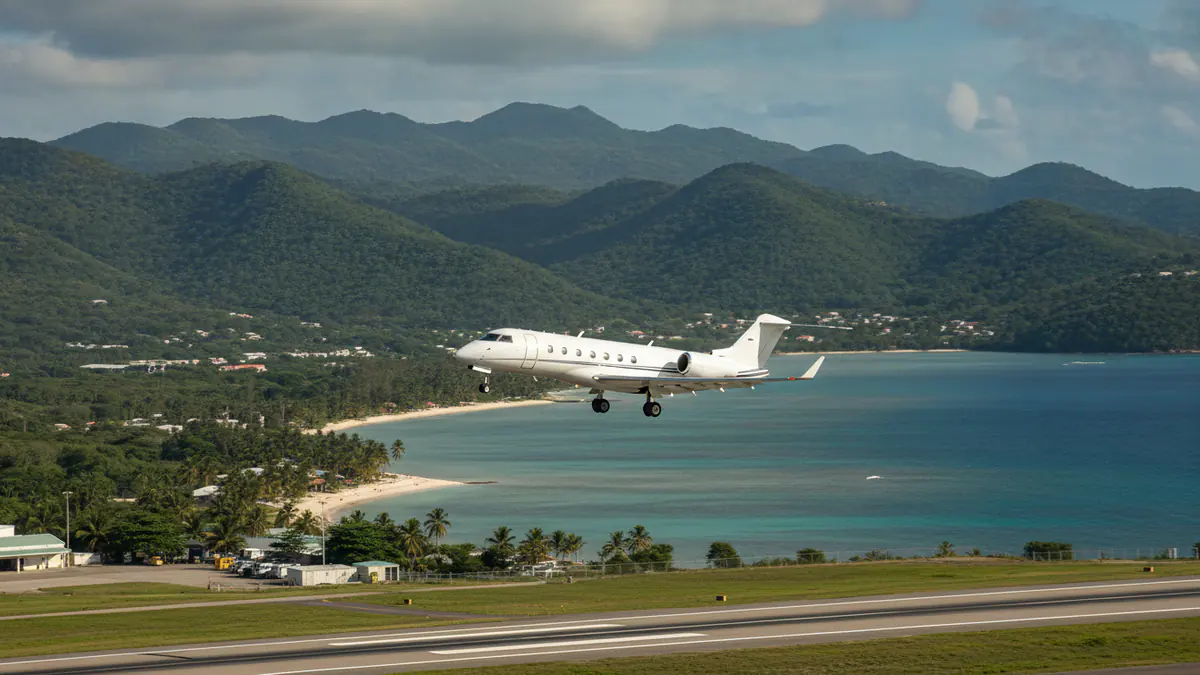 Private jets Jamaica Private jets Jamaica: business jet taking off with Jamaica in the background